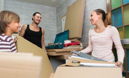 Commercial moving team packing office equipment