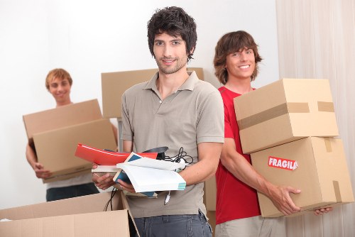 Professional movers handling furniture pick-up in Storage Hounslow